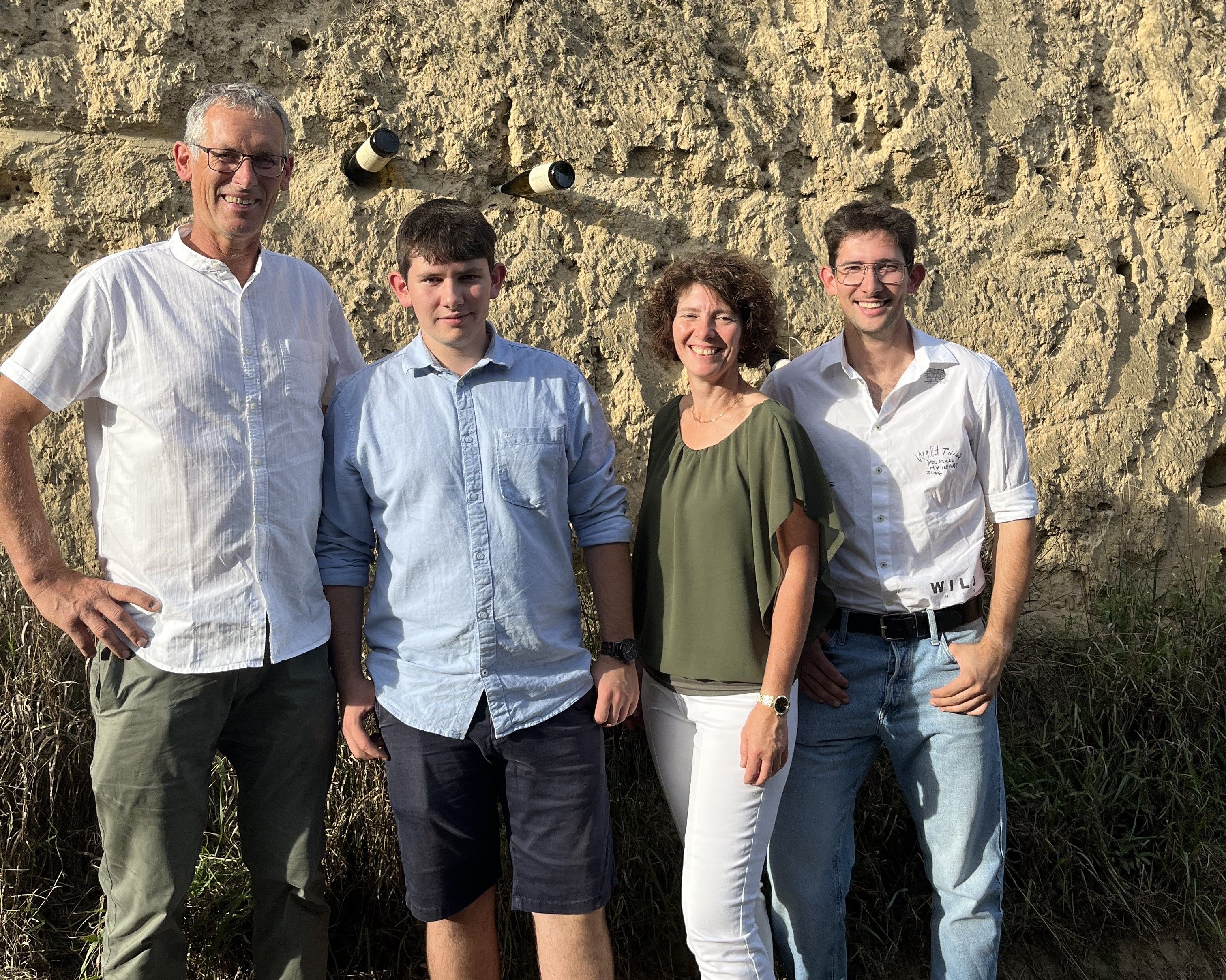 The Reinberger family in front of a loess wall