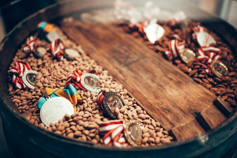 Medals on a barrel of grain.
